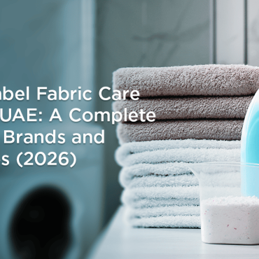 Private label fabric care products UAE with laundry detergent bottles and folded towels
